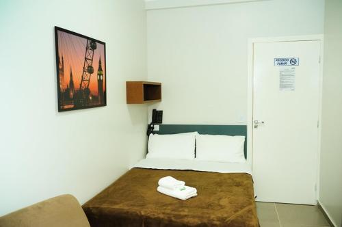TV a/nebo společenská místnost v ubytování London Executive Hotel