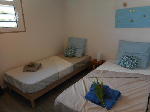 מיטה או מיטות בחדר ב-Ti Cosy