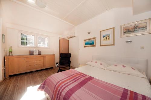 Postel nebo postele na pokoji v ubytování Bruno Split Centre Apartment and Room