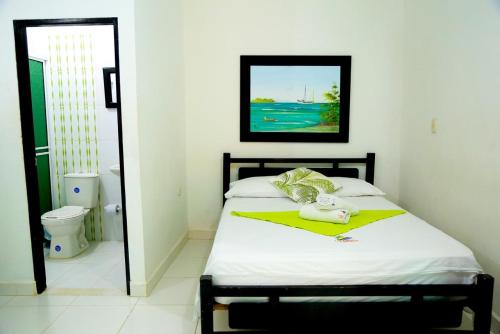 Katil atau katil-katil dalam bilik di Casa Hotel Las Antillas