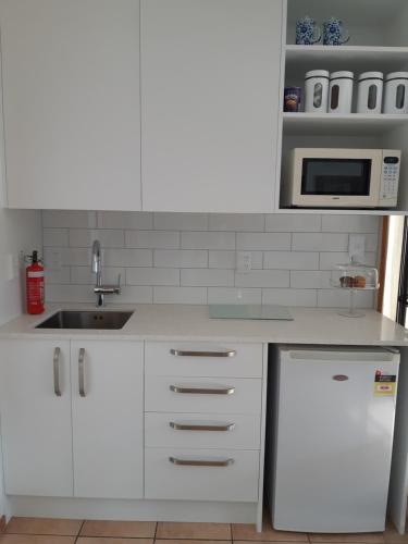 Una cocina o zona de cocina en Maples on Harewood