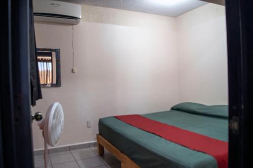 Postel nebo postele na pokoji v ubytování Isabel Suites