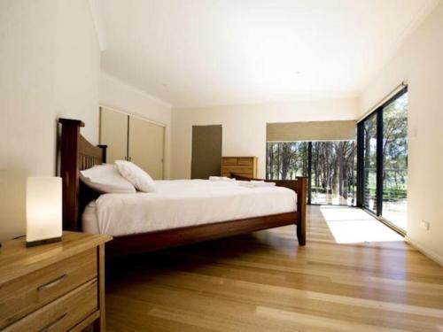 En eller flere senger på et rom på Kanga View