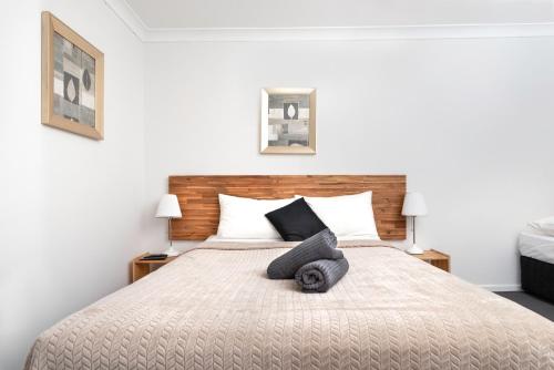Ein Bett oder Betten in einem Zimmer der Unterkunft Bald Hills Motel