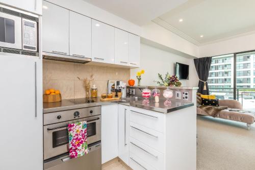 Dapur atau dapur kecil di Vacations on Viaduct Harbour Auckland - Best Location