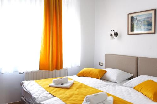 Cama ou camas em um quarto em Guesthouse KUBUS