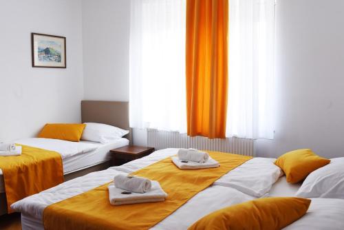 Cama o camas de una habitación en Guesthouse KUBUS