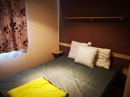 Krevet ili kreveti u jedinici u okviru objekta Mobil-Home en camping****