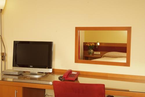 Μια τηλεόραση ή/και κέντρο ψυχαγωγίας στο Hotel Vila Emei
