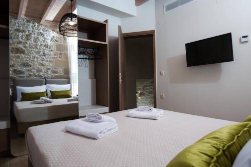 Ένα ή περισσότερα κρεβάτια σε δωμάτιο στο Kamartos Villa 1