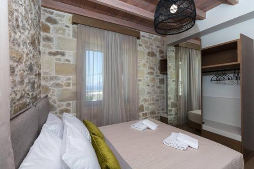 Ένα ή περισσότερα κρεβάτια σε δωμάτιο στο Kamartos Villa 1