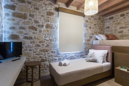 Ένα ή περισσότερα κρεβάτια σε δωμάτιο στο Kamartos Villa 1