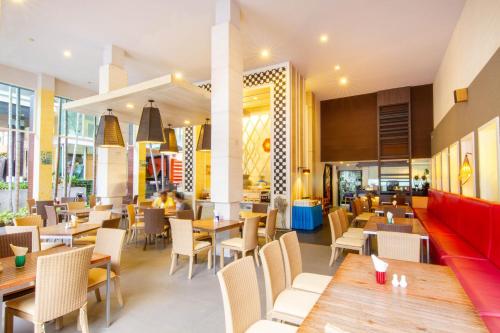 Restoran ili neka druga zalogajnica u objektu FuramaXclusive Sandara Hua Hin at Cha-am Beach