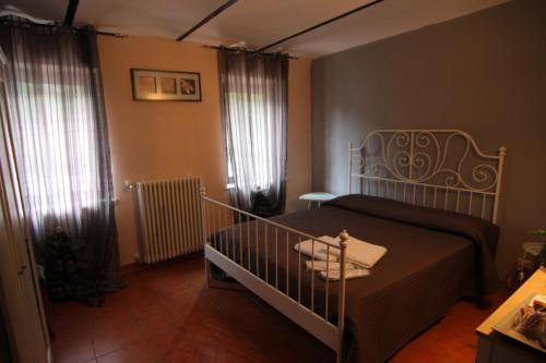 Postel nebo postele na pokoji v ubytování Il sogno di maggy