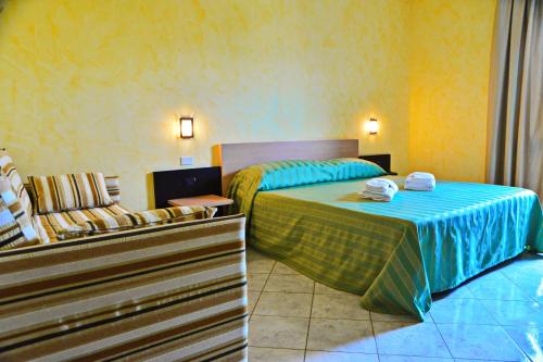 Postel nebo postele na pokoji v ubytování Hotel Onda Bleu