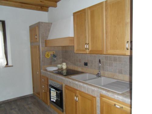 Kuchyň nebo kuchyňský kout v ubytování AGRITURISMO LA CIVITELLA