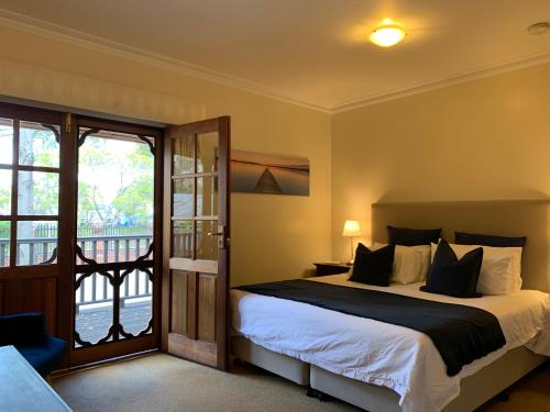 Katil atau katil-katil dalam bilik di Guildford River Retreat