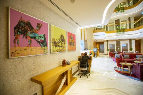 a lobby of a hospital with a waiting room at Gulf Inn Hotel Al Nasr Formerly Roda Links Al Nasr in Dubai