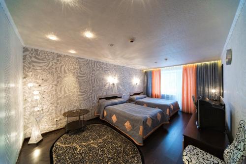 Кровать или кровати в номере Гостиница Шведка
