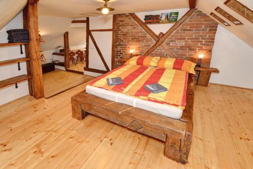 Postel nebo postele na pokoji v ubytování Apartmán u Brány