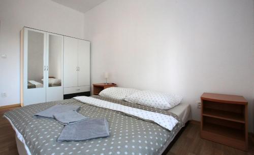 Posteľ alebo postele v izbe v ubytovaní Penzion - Apartments Pod Javořicí