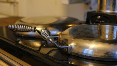 a pair of pots and pans sitting on top of a stove at Private Castle with Park - Château Guillermo in La Moncelle