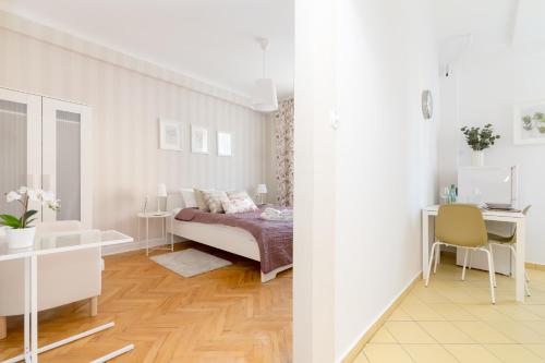 Posteľ alebo postele v izbe v ubytovaní Chmielna Central Warsaw Apartment