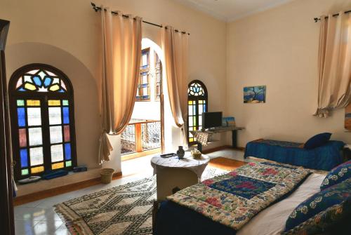 Postel nebo postele na pokoji v ubytování Riad AlKATIB Meknès