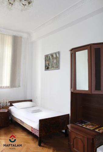 Postel nebo postele na pokoji v ubytování Naftalan Guest House