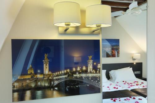 Katil atau katil-katil dalam bilik di Hotel du College de France