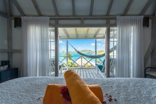 Postel nebo postele na pokoji v ubytování Cocobay Resort Antigua - All Inclusive - Adults Only