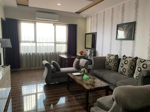 Χώρος καθιστικού στο Pacific Hotel Ambon