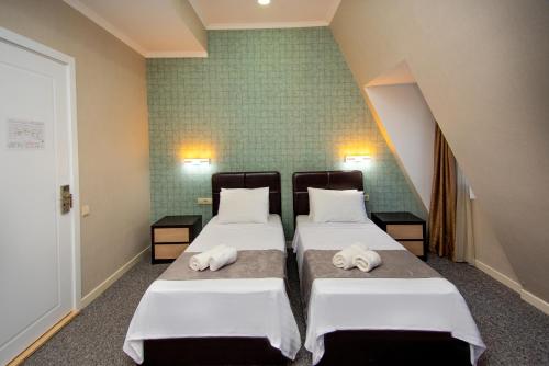 Cama o camas de una habitación en Margi Boutique Hotel by DNT Group