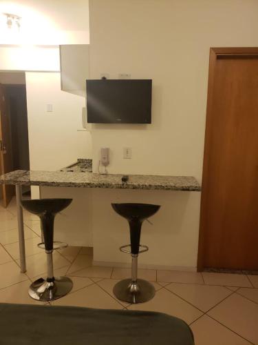 TV a/nebo společenská místnost v ubytování Spot Residence São Carlos 700m da USP