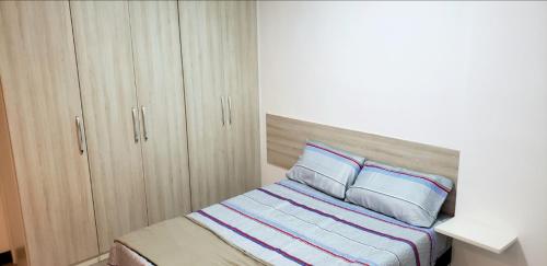 Postel nebo postele na pokoji v ubytování Spot Residence São Carlos 700m da USP