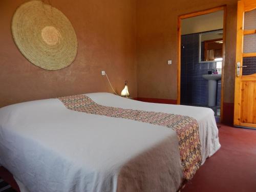 Ένα ή περισσότερα κρεβάτια σε δωμάτιο στο Kasbah du Bout du Monde
