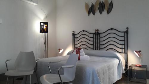 Voodi või voodid majutusasutuse Langhe di Liguria B&B toas