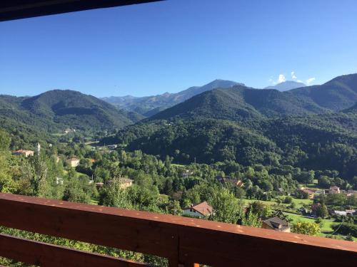 a view of the mountains from the balcony of a house at Chalet Alma in Frabosa Sottana