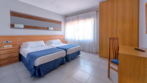 
Cama o camas de una habitación en Vivero Playa
