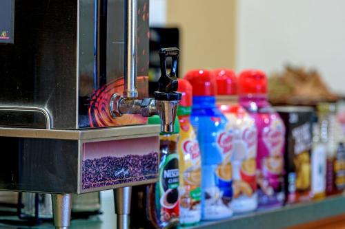 a group of bottles of drinks on a counter at The Gunnison Inn at Dos Rios Golf Course in Gunnison