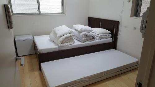 Ένα ή περισσότερα κρεβάτια σε δωμάτιο στο Sophiearth Apartment