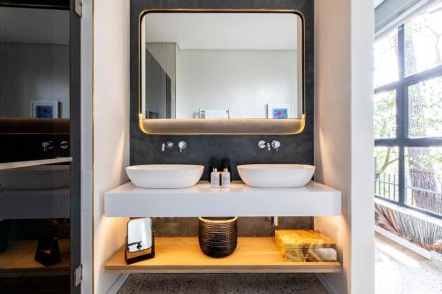 a bathroom with a sink and a counter top at Camissa House in Cape Town