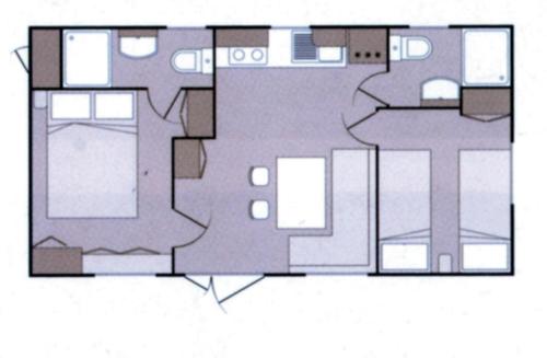 a floor plan of a small house with at Victoria Mobilehome BI VILLAGE in Fažana
