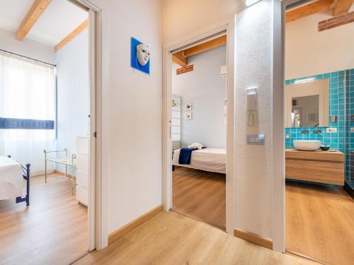 a room with a door leading to a bedroom at "Bea's Terrace" - Private Jacuzzi and panoramic rooftop in the City Centre in Cagliari