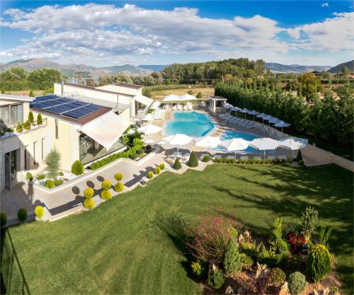 an aerial view of a villa with a swimming pool at Calma Hotel & Spa in Kastoria