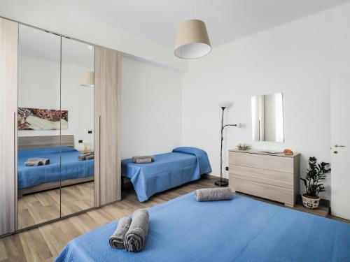 Säng eller sängar i ett rum på Brand New Cinque Terre Cozy Flat