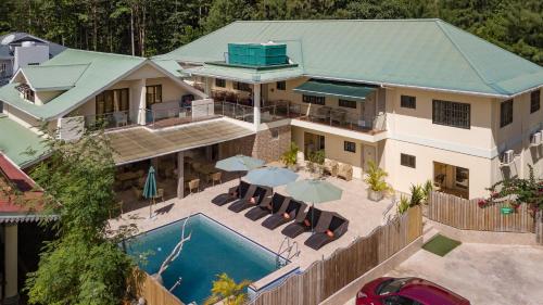 an aerial view of a house with a swimming pool at Chez Bea Luxury Villa in Baie Sainte Anne