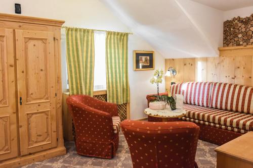 Χώρος καθιστικού στο Hotel Relais Grünwald