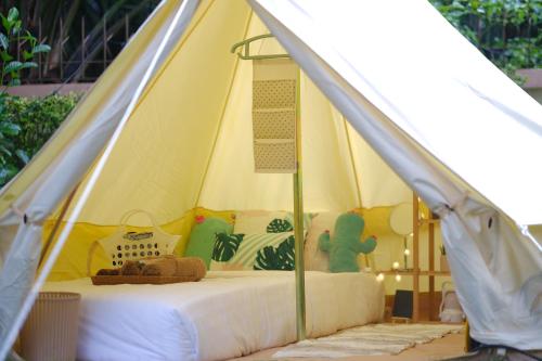 Un ou plusieurs lits dans un hébergement de l'établissement O Little Tent de Koh Chang