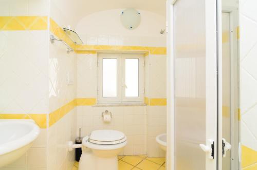 Kylpyhuone majoituspaikassa Albergo Villa Giusto